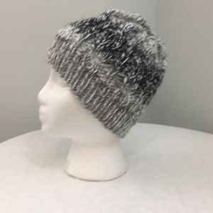 Cable stitch knitted hat:  variegated white black